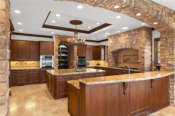 Chandelier, Interior, Kitchen, Recessed Lighting, Stainless Steel Appliances, Stone Walls