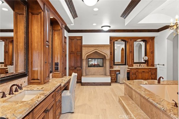 Bathroom, Dual Sink Vanities, Interior, Recessed Lighting, Wood Texture Flooring