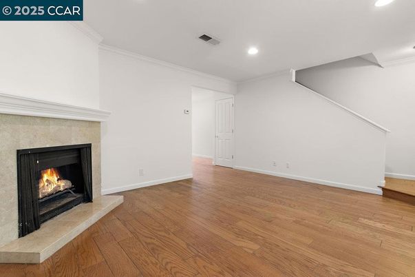 Empty room, Fireplace, Interior, Recessed Lighting, Wood Texture Flooring