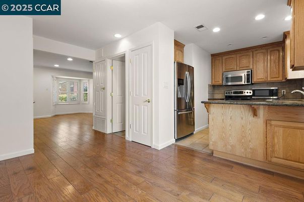 Interior, Kitchen, Recessed Lighting, Stainless Steel Appliances, Wood Texture Flooring