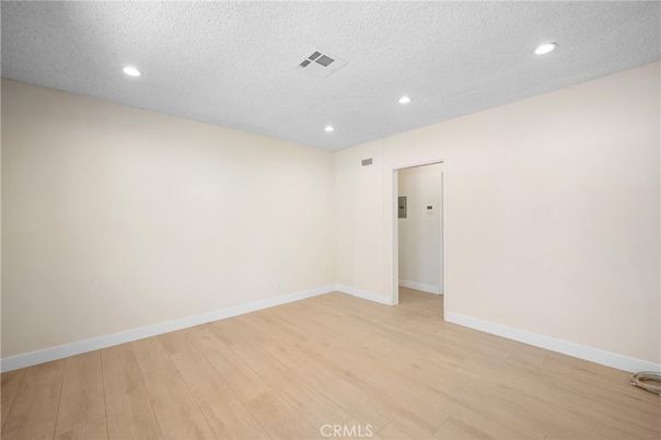Elevator, Empty room, Interior, Recessed Lighting, Wood Texture Flooring