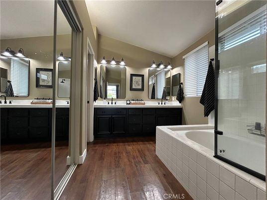 Bathroom, Dual Sink Vanities, Glass Shower, Interior, Wood Texture Flooring