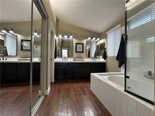 Bathroom, Dual Sink Vanities, Glass Shower, Interior, Wood Texture Flooring