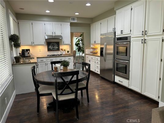 Dining room, Interior, Kitchen, Recessed Lighting, Stainless Steel Appliances, Wood Texture Flooring