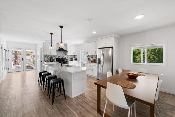 Dining room, Interior, Kitchen, Pendant Lights, Recessed Lighting, Stainless Steel Appliances, Wood Texture Flooring