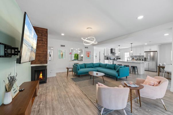 Fireplace, Interior, Kitchen, Living room, Pendant Lights, Recessed Lighting, Stainless Steel Appliances, Wood Texture Flooring