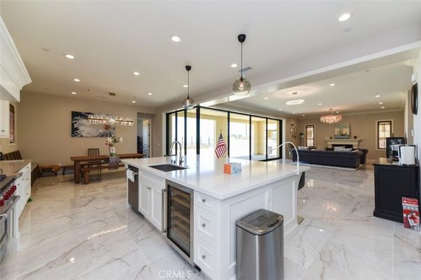 Chandelier, Dining room, Interior, Kitchen, Living room, Marble, Pendant Lights, Recessed Lighting, Stainless Steel Appliances