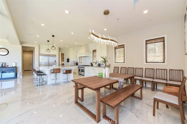 Chandelier, Dining room, Interior, Kitchen, Marble, Pendant Lights, Recessed Lighting, Stainless Steel Appliances
