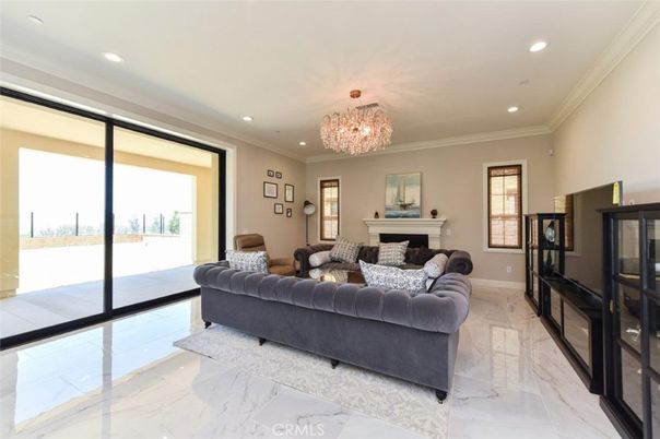 Chandelier, Fireplace, Interior, Living room, Marble, Recessed Lighting