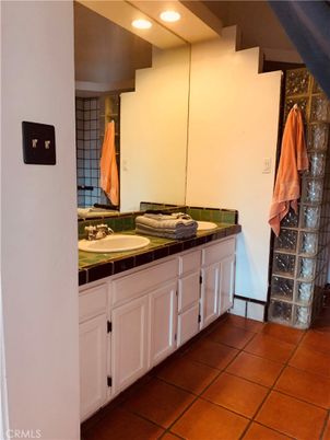 Bathroom, Dual Sink Vanities, Interior, Recessed Lighting, Tile Countertops