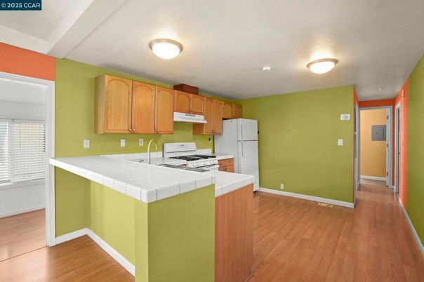 Interior, Kitchen, Tile Countertops, Wood Texture Flooring