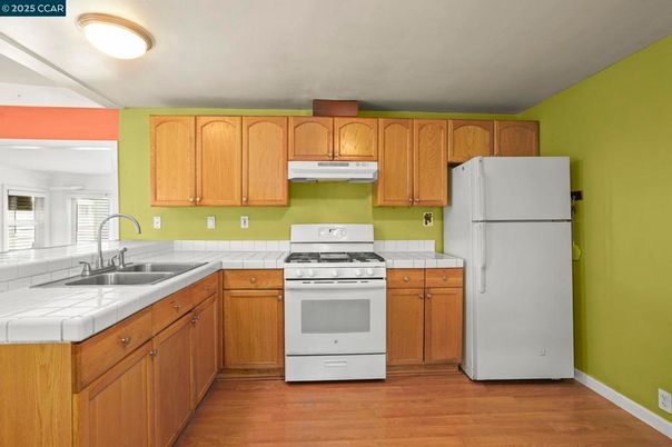 Interior, Kitchen, Tile Countertops, Wood Texture Flooring