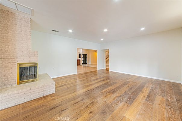 Empty room, Fireplace, Interior, Recessed Lighting, Wood Texture Flooring