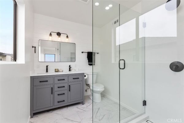 Bathroom, Dual Sink Vanities, Glass Shower, Interior, Marble, Recessed Lighting