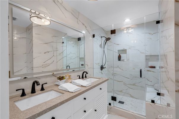 Bathroom, Dual Sink Vanities, Glass Shower, Interior, Marble Walls, Recessed Lighting