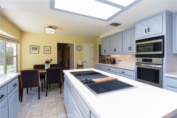 Fireplace, Interior, Kitchen, Stainless Steel Appliances, Stone Walls