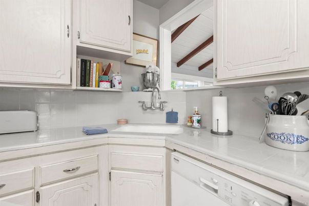 Interior, Kitchen, Tile Countertops, Wooden Beams