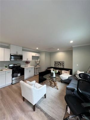 Interior, Kitchen, Living room, Recessed Lighting, Stainless Steel Appliances, Wood Texture Flooring