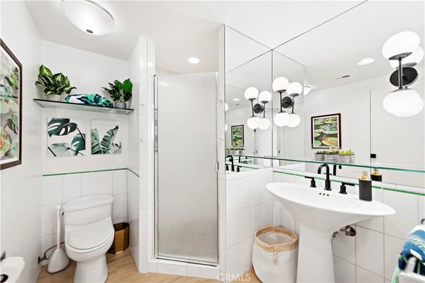 Bathroom, Glass Shower, Interior, Pendant Lights, Recessed Lighting, Wood Texture Flooring