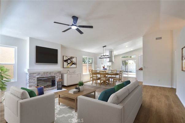 Dining room, Fireplace, Interior, Living room, Pendant Lights, Recessed Lighting, Wood Texture Flooring