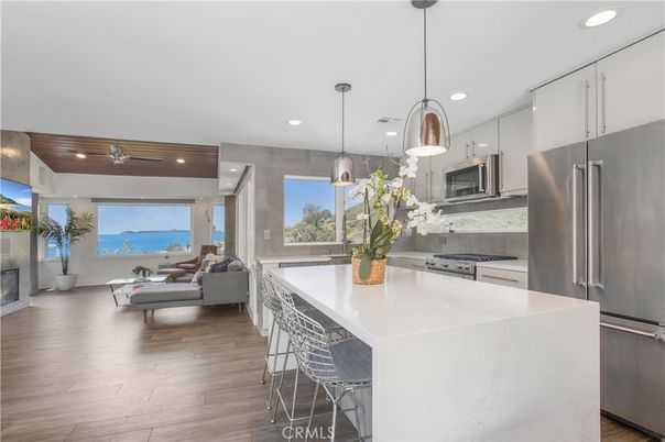 Interior, Kitchen, Living room, Pendant Lights, Recessed Lighting, Stainless Steel Appliances, Water, Wood Texture Flooring