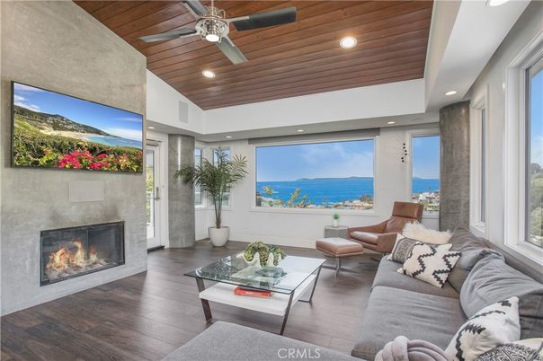 Fireplace, Interior, Living room, Recessed Lighting, Water, Wooden Ceilings, Wood Texture Flooring