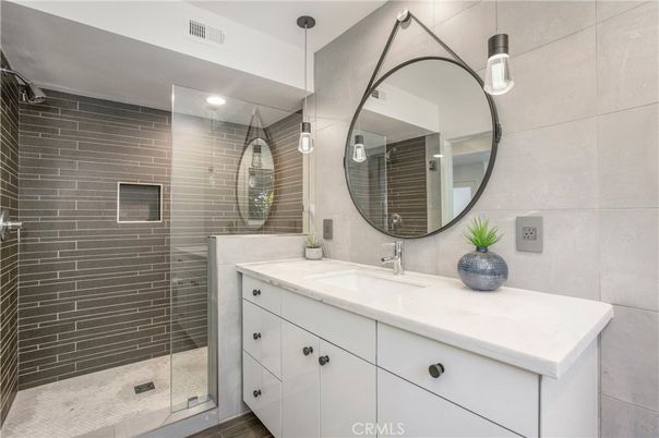 Bathroom, Dual Sink Vanities, Glass Shower, Interior, Pendant Lights, Recessed Lighting