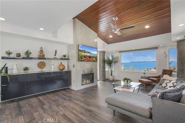 Fireplace, Interior, Living room, Recessed Lighting, Water, Wooden Ceilings, Wood Texture Flooring