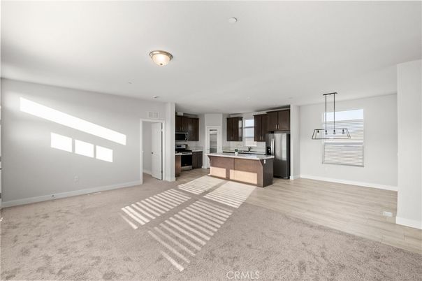 Empty room, Interior, Kitchen, Pendant Lights, Stainless Steel Appliances, Wood Texture Flooring