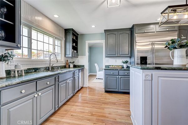 Dining room, Interior, Kitchen, Recessed Lighting, Stainless Steel Appliances, Wood Texture Flooring