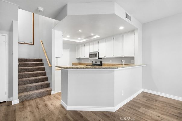 Interior, Kitchen, Recessed Lighting, Stainless Steel Appliances, Wood Texture Flooring