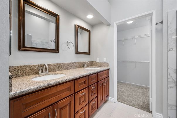 Bathroom, Dual Sink Vanities, Interior, Recessed Lighting, Walk-in Closets