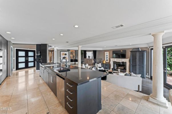 Fireplace, Interior, Kitchen, Living room, Recessed Lighting, Stainless Steel Appliances