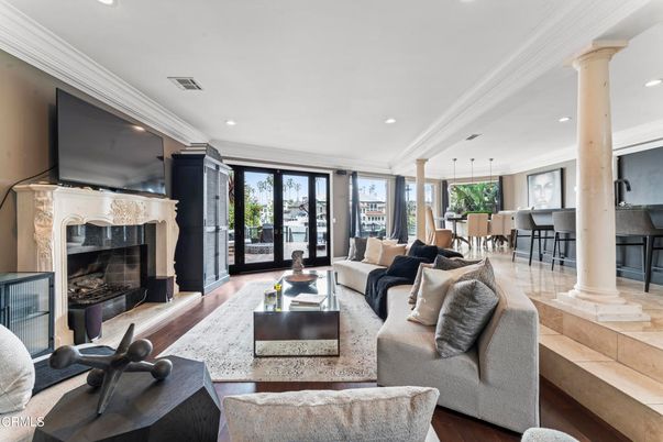 Dining room, Fireplace, Interior, Living room, Pendant Lights, Recessed Lighting, Wood Texture Flooring