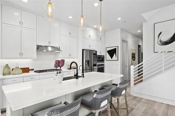 Interior, Kitchen, Pendant Lights, Recessed Lighting, Stainless Steel Appliances, Wood Texture Flooring
