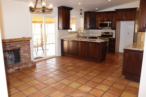 Fireplace, Interior, Kitchen, Pendant Lights, Recessed Lighting, Stainless Steel Appliances
