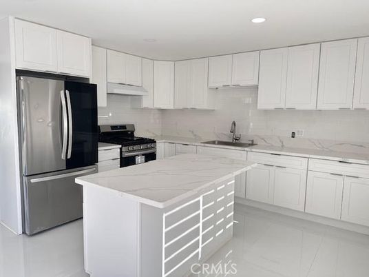Interior, Kitchen, Marble, Marble Walls, Recessed Lighting, Stainless Steel Appliances