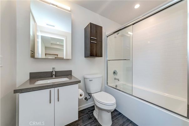 Bathroom, Glass Shower, Interior, Recessed Lighting, Wood Texture Flooring