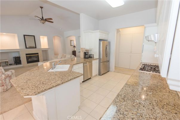 Fireplace, Interior, Kitchen, Recessed Lighting, Stainless Steel Appliances
