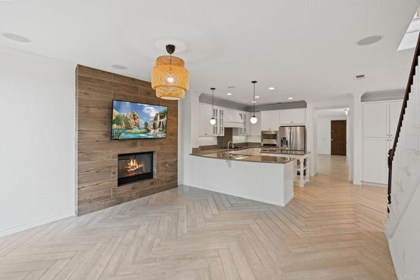 Fireplace, Interior, Kitchen, Pendant Lights, Recessed Lighting, Stainless Steel Appliances, Wood Texture Flooring