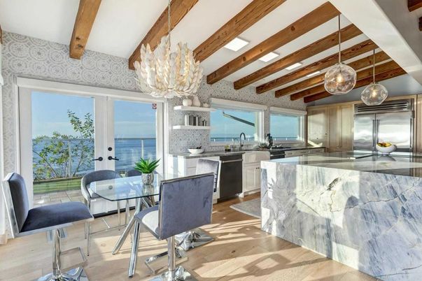 Chandelier, Dining room, Interior, Kitchen, Pendant Lights, Stainless Steel Appliances, Water, Wooden Beams, Wood Texture Flooring