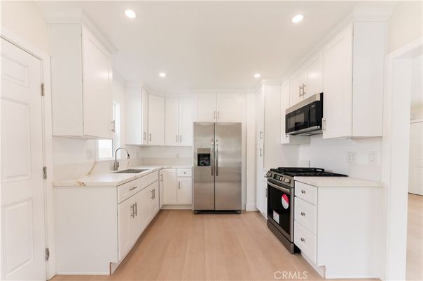 Interior, Kitchen, Recessed Lighting, Stainless Steel Appliances, Wood Texture Flooring