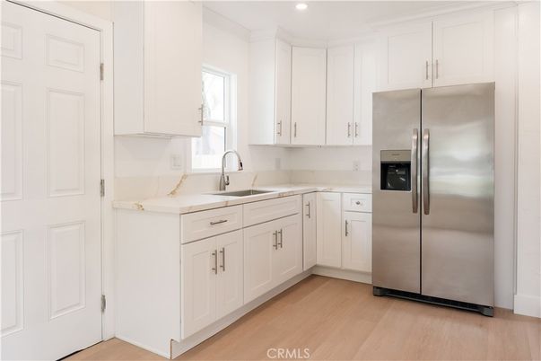 Interior, Kitchen, Recessed Lighting, Stainless Steel Appliances, Wood Texture Flooring