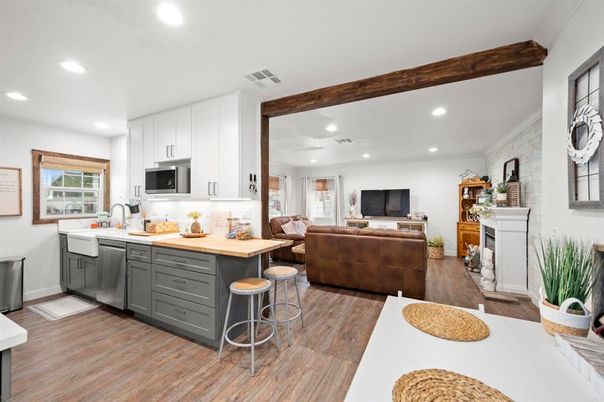 Fireplace, Interior, Kitchen, Living room, Recessed Lighting, Stone Walls, Wood Texture Flooring