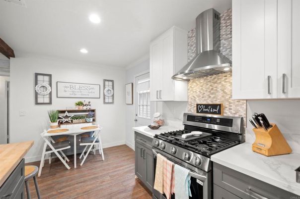 Dining room, Interior, Kitchen, Recessed Lighting, Stainless Steel Appliances, Wood Texture Flooring