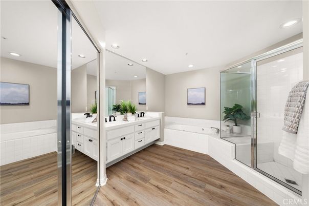 Bathroom, Dual Sink Vanities, Glass Shower, Interior, Recessed Lighting, Wood Texture Flooring