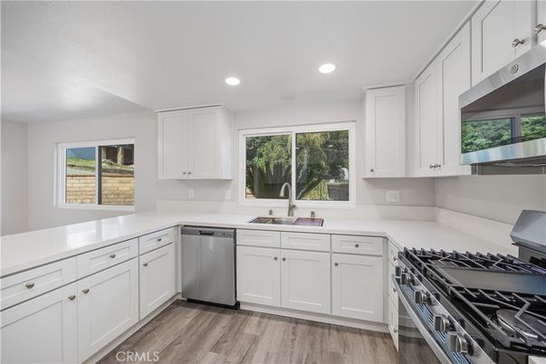 Interior, Kitchen, Recessed Lighting, Stainless Steel Appliances, Wood Texture Flooring