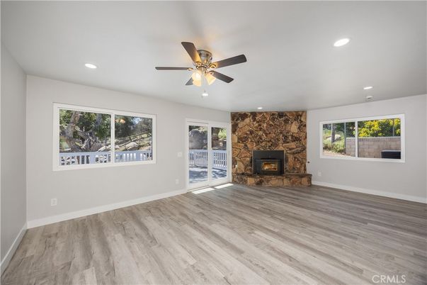 Empty room, Fireplace, Interior, Recessed Lighting, Wood Texture Flooring