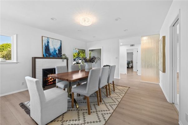 Dining room, Fireplace, Interior, Recessed Lighting, Wood Texture Flooring