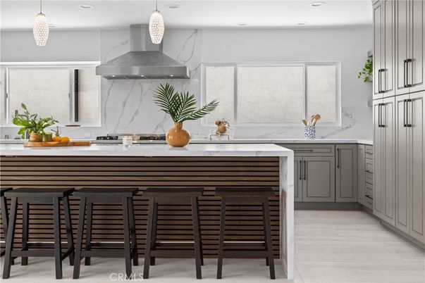 Interior, Kitchen, Marble Walls, Pendant Lights, Recessed Lighting, Stainless Steel Appliances